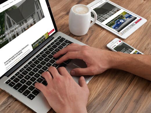 Immobilienmakler-Website auf Laptop und Mobilgeräten: Makler-Homepage und Immobilien-Exposé-Texte, erstellt vom Immobilientexter